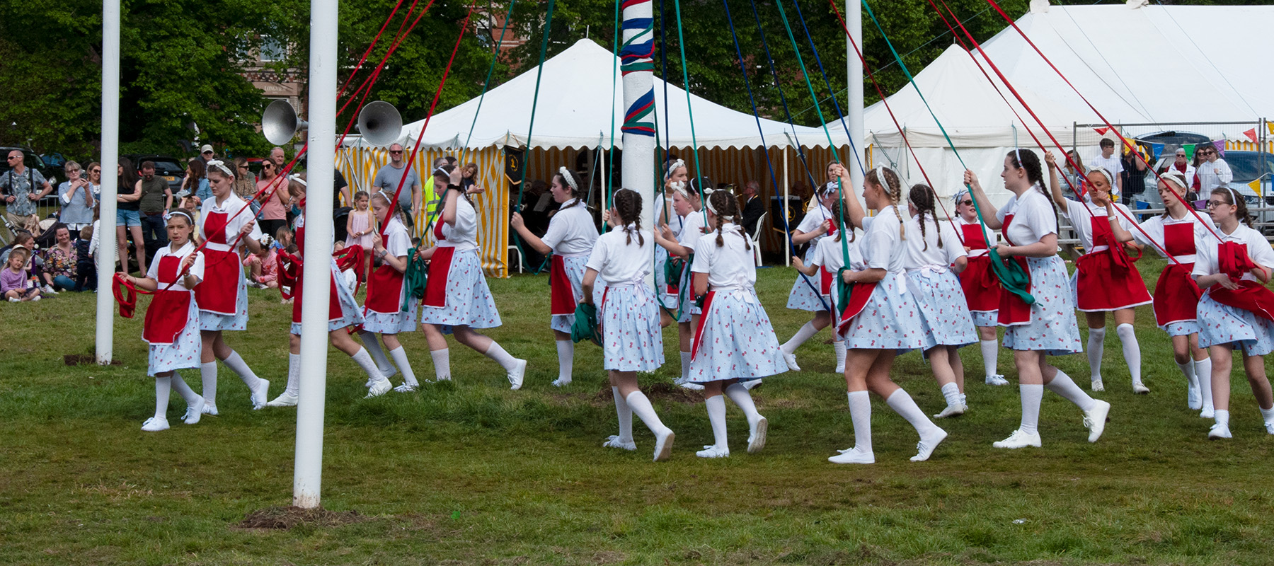 May Day is celebrated on the 1st of May in the UK to welcome spring. Traditional activities include maypole dancing, music, and festivals in towns and villages. It celebrates nature, new beginnings, and community.